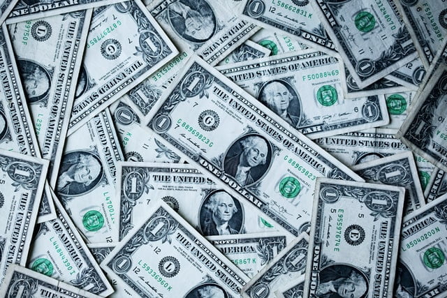 A bunch of dollar bills.