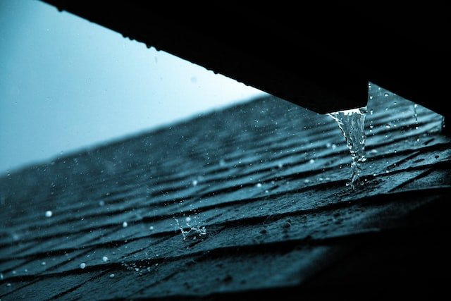 Water draining down a roof.
