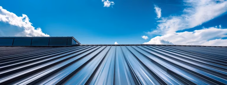 a sleek urban skyline with resilient metal rooftops glistening under a bright blue sky, showcasing the strength and durability that minneapolis businesses value.