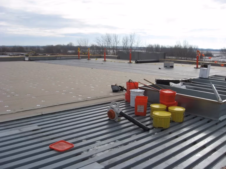 Commercial Maintenance Roofing - A Flat Roof with Maintenance Equipment on it